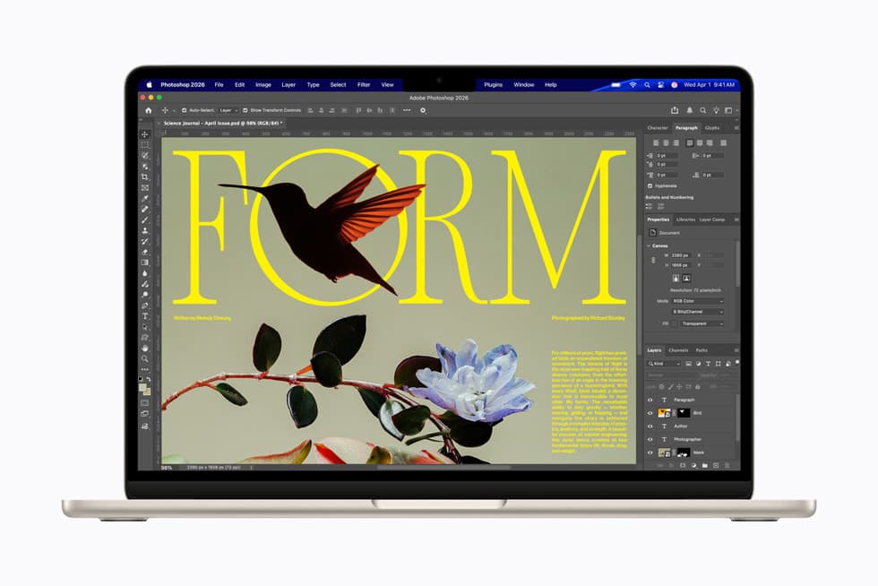 A starlight MacBook Air, open and seen straight on against a white background, its screen showing Adobe Photoshop 2026 with a magazine page: the word FORM in large yellow serif capitals over a hummingbird silhouette, with a green branch and a blue flower below.