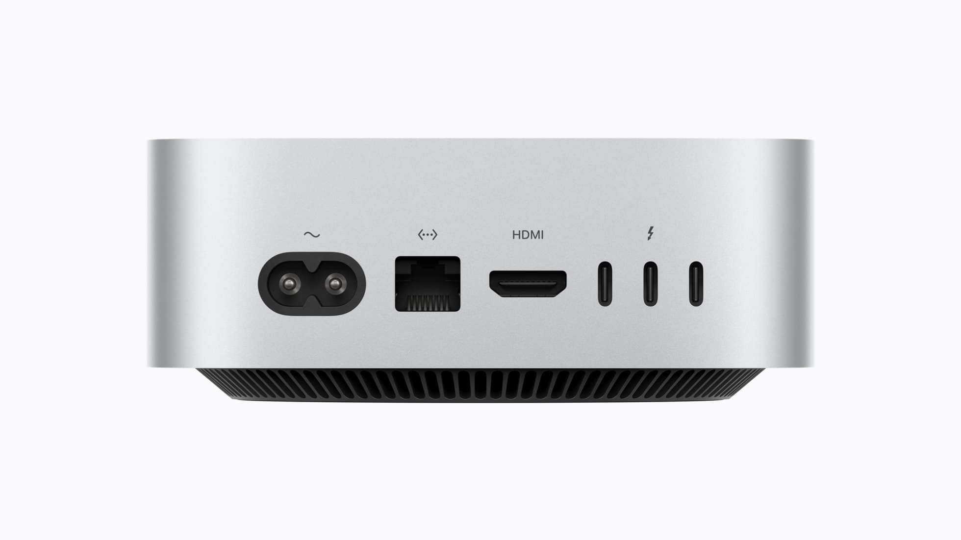 The back of a silver Mac mini seen straight on against a white background: a two-pin power inlet, an Ethernet jack, an HDMI port and three Thunderbolt ports in a row, above the black vented base.